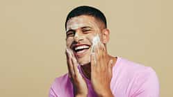 Portrait,Of,A,Handsome,Young,Man,Indulging,In,His,Grooming