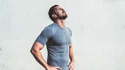 Exhausted,Male,With,Hands,On,Waist,And,Closed,Eyes,In