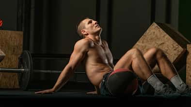 Young,Muscular,Man,Drinking,Protein,Shake,After,Working,Out,Indoors.