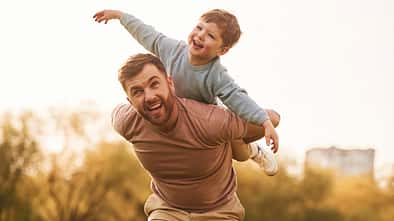 Conception,Of,Imagination,,Sitting,On,Shoulders,And,Flying.,Happy,Father