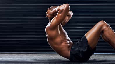 Male,Athlete,,Crunches,On,Exercise,Mat,For,Workout,,Sports,As