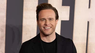 Olly Murs lächelt in die Kamera auf der "Better Man" Premiere