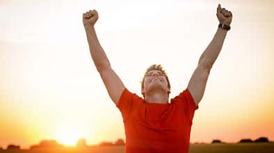 Successful,Man,Raising,Arms,After,Cross,Track,Running,On,Summer