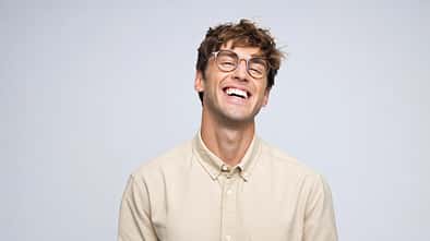 Studio portrait of handsome young Caucasian male