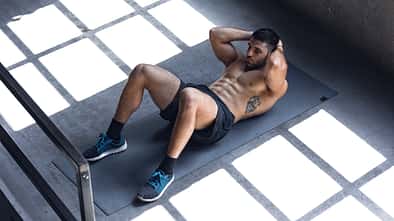 Strong, Muscular Man Doing Crunches