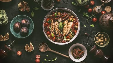 Grilled chicken breast with Mediterranean ingredients sauce