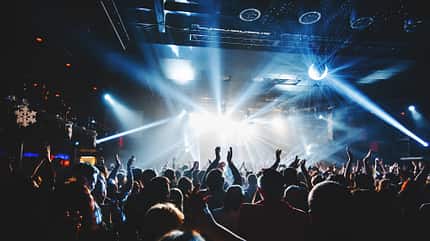smartphone,crowd,concert,fan,music,projector,club,dance,nightclu Silhouette,Of,Concert,Crowd,In,Front,Of,Bright,Stage,Lights.