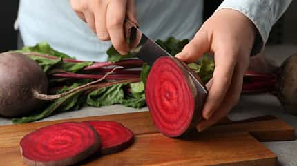 cut,hands,nutrient,salad,man,gourmet,vegetable,red,leaves,beet Woman,Cutting,Fresh,Red,Beet,At,Table,,Closeup