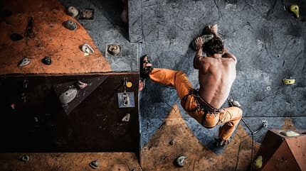 muscular,boulder,hang,strong,strength,cliff,young,rope,exercise, Muscular,Man,Practicing,Rock-climbing,On,A,Rock,Wall,Indoors