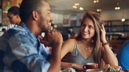 date,couple,lunch,caucasian,happy,inside,smile,casual,copy space Its,Turning,Into,An,Impressive,First,Date.,Cropped,Shot,Of
