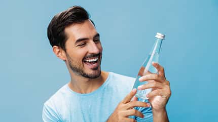 studio,handsome,beauty,young,caucasian,confident,happy,isolated, Man,Bottle,Water,Sport,Smile,Studio,T-shirt,Drink