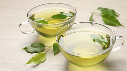 taste,detox,freshness,chinese,tea,japanese,leaves,floral,antioxi Refreshing,Green,Tea,In,Cups,And,Leaves,On,Wooden,Table,