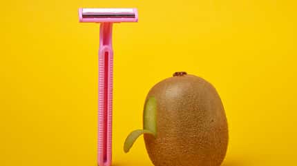 kiwi,depilate,beauty,space,blade,hygiene,cosmetic,female,dermato Pink,Shaving,Machine,And,Shaved,Kiwi,On,A,Yellow,Background