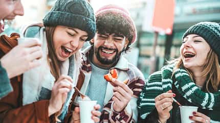 college,mulled wine,couple,friendship,year,happy,teenagers,youth Happy,Friends,Having,Fun,Drinking,Mulled,Wine,And,Hot,Chocolate