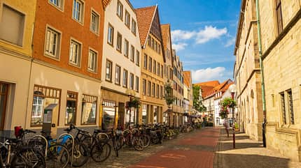 Historic street filled with bicycles in Osnabrück, Germany. Historic street filled with bicycles in Osnabrück, Germany.