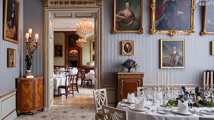 interior design:CB2,castle:CB2,restaurant:CB2,hotel:CB2,corner:CB2,wedding reception:CB2,indoors:CB2,nobody:CB2,chair:CB2,dining table:CB2,chandelier:CB2,wine glass:CB2,Kronberg im Taunus:CB2,1890s:CB2,19th Century:CB2,old building:CB2,view through:CB2,cabinet:CB2,19c:CB2,light fitting:CB2,five star hotel:CB2,double door:CB2,gilt framed:CB2,chair back:CB2 Schlosshotel Kronberg