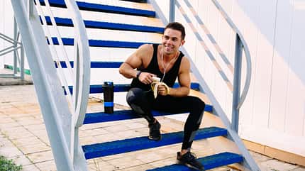 muscular,caucasian,headphones,happy,stairs,body,enjoying,fit,fit Handsome,Smiling,Sportsman,In,Headphones,,Eating,A,Banana,,After,Workout,