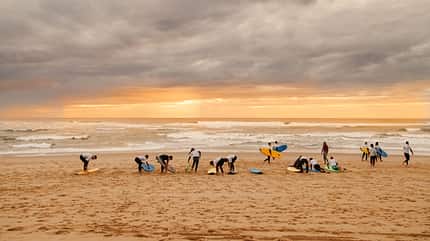 Surfers at sunset in Hossegor