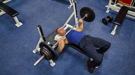 facial expression,strength,determination,barbell,fit,bar,fitness Man,Doing,Bench,Press,At,The,Gym,,Top,View