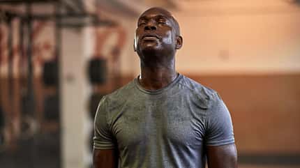 muscular,happy,exhausted,focus,determination,inside,fit,fitness, Fit,Young,African,American,Man,Standing,With,His,Eyes,Closed