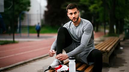Handsome man preparing for working out Handsome man preparing for working out
