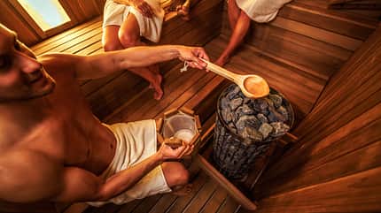Group of friends enjoying their day in sauna