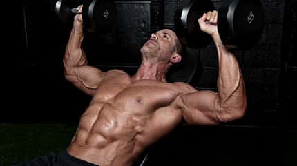 Man lifting weights Man lifting weights