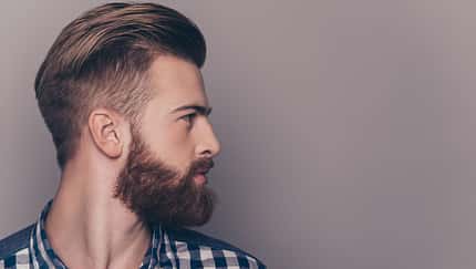 Side,View,Portrait,Of,Thinking,Stylish,Young,Man,Looking,Away