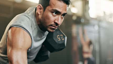 Serious,Man,,Dumbbell,And,Weightlifting,In,Workout,,Exercise,Or,Fitness