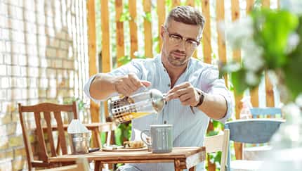 Tea,Lover.,Handsome,Man,In,Glasses,Filling,His,Cup,With