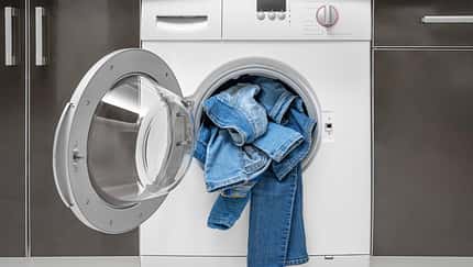 Washing,Denim,Items,In,The,Washing,Machine.,Delicate,Cleaning.