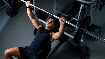 Young Man Working Out in the Gym