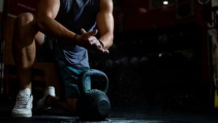 Medium,Shot,Of,Man,Putting,Magnesium,In,His,Hands