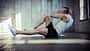 Young,Fit,Man,Exercising,In,A,Gym