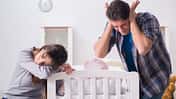 Cute,Nice,Little,Baby,Girl,Crying,Lying,With,Her,Mom