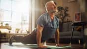 Strong,Athletic,Fit,Senior,Man,Training,On,A,Yoga,Mat,