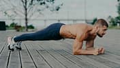 Motivated,Male,Athlete,Does,Abs,Exercise,,Enjoys,Bodybuilding,Training,Outdoor