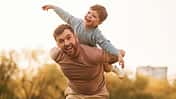 Conception,Of,Imagination,,Sitting,On,Shoulders,And,Flying.,Happy,Father