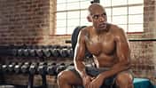 Shirtless,African,Sportsman,Resting,After,Training,At,Gym.,Mature,Muscular