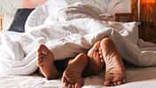Passionate,Love.,Feet,Of,A,Young,Couple,That,Lying,On