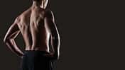 Attractive,Sensual,Man,Posing,And,Showing,Off,His,Muscular,Back,