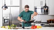 Chef,Cook,Cooking,With,Pan,At,Kitchen.,Chef,Cook,Prepares