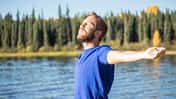 Beautiful,Travel,People Traveling,Tourism,Portrait,Arms Outstretched,Young Men,Men,Males,Inhaling,Beauty In Nature,Inspiration,Snowcapped,Pine Tree,20-29 Years,Young Adult,Smiling,Arms Raised,Scenics,Caucasian Ethnicity,Success,Balance,Harmony,Contemplation,Freshness,Getting Away From It All,Aspirations,Relaxation,Carefree,Freedom,Enjoyment,Happiness,Tranquil Scene,Blue,Turquoise Colored,Vacations,Nature,Lifestyles,Outdoors,Cheerful,Positive Emotion,Hiking,Beard,People,Yukon,Canada,Autumn,Landscape,Lake,Air Young cheerful man relaxing by the lake arms outstretched